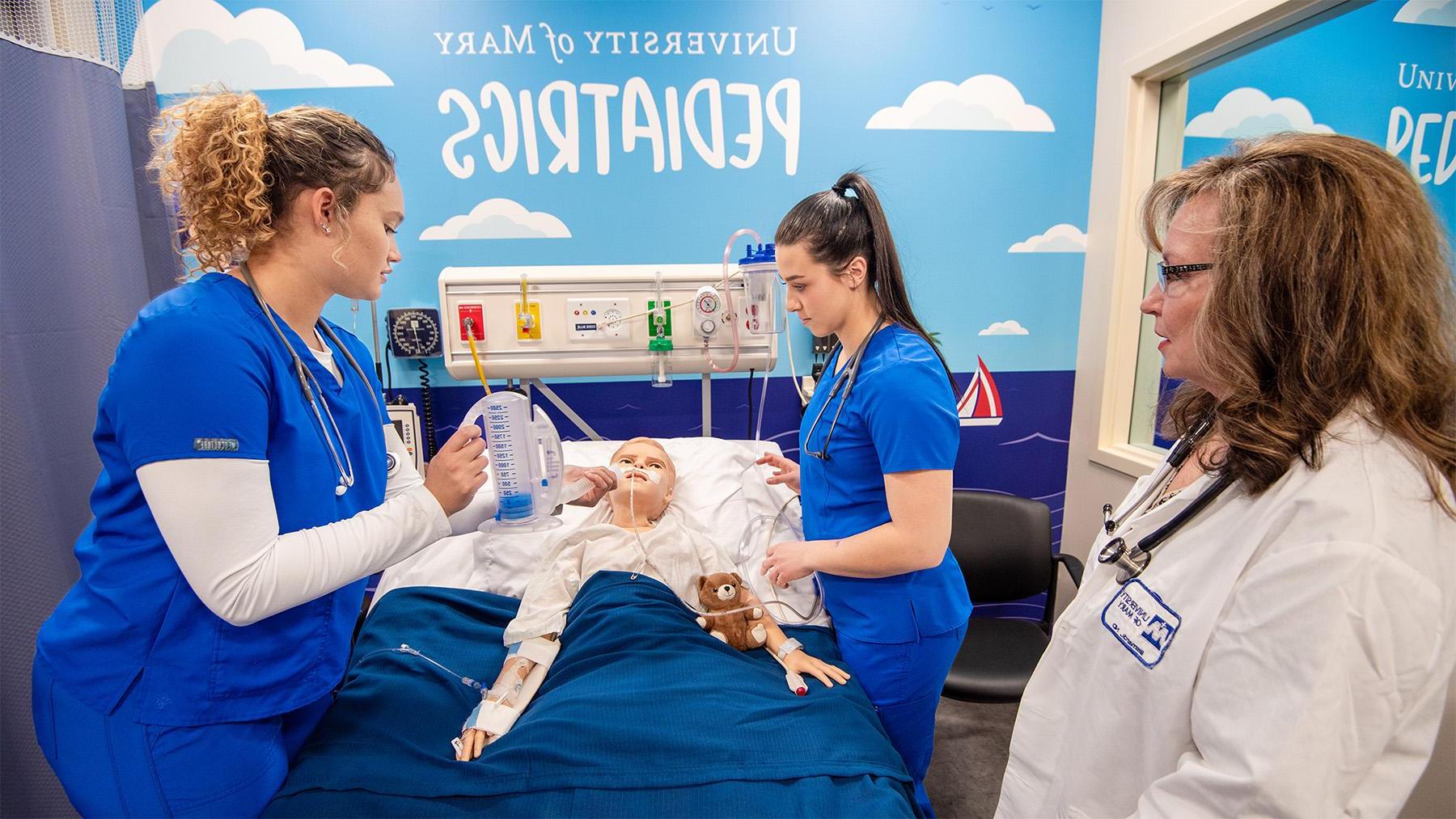 Nursing Students practicing in the nursing simulation labs